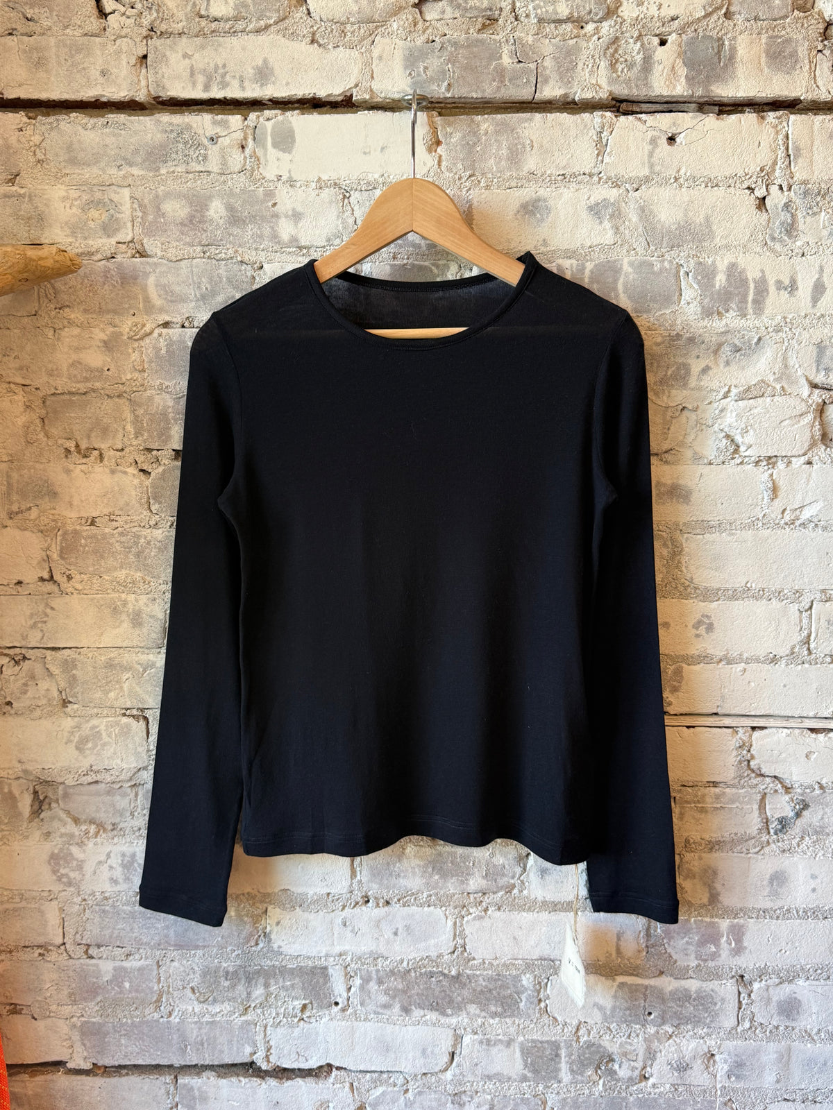 Women's navy Cashmere Silk Jersey Long Sleeve Crew by V::Room, soft and luxurious knit top with a relaxed fit.