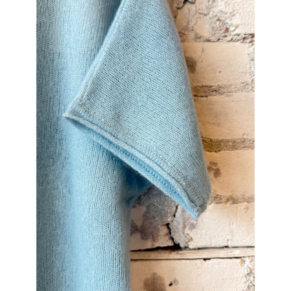 Women's cashmere silk short-sleeve crewneck top in Bleu Calanques by Majestic Filatures, shown in a close-up of the fabric and neckline.