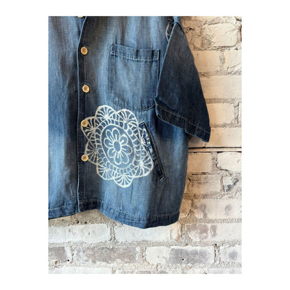 Women's chambray cropped military shirt by MONOSTERO with medallion print, featuring a button-up front and short sleeves.