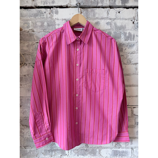 LMND women's Chiara long sleeve shirt in fuchsia, true red, and natural colors, shown in a stylish fit and fabric detail.