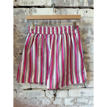 Women's Chiara Mid Length Shorts in vibrant fuchsia multi-stripe pattern by LMND, showing the colorful striped design and mid-length fit.