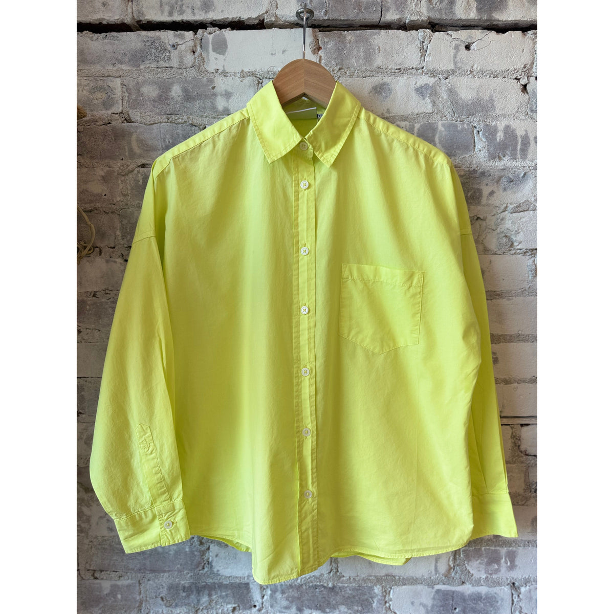 Women's Chiara Shirt in Sunny Lime by LMND, featuring a vibrant lime green fabric with a relaxed fit and stylish collar.