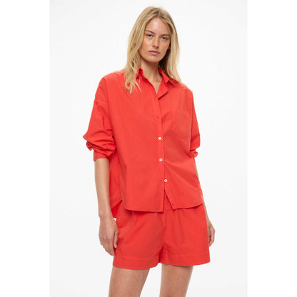 Women's Chiara Shirt in True Red by LMND, featuring a stylish fit and vibrant color, shown on a mannequin.