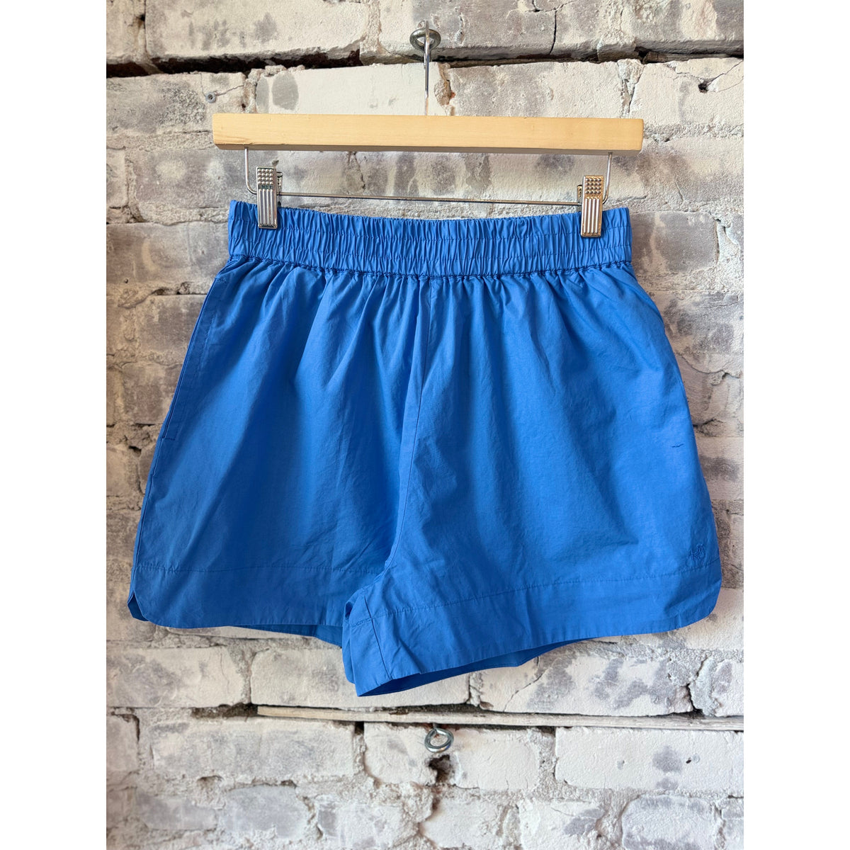Women's LMND Chiara Shorts in ink blue, showing the stylish denim design and fit on a model.