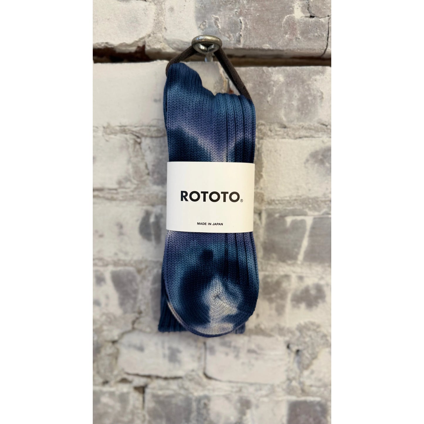 Men's chunky tie dye rib crew socks by Rototo in indigo and navy with bold, colorful tie dye pattern and ribbed texture.