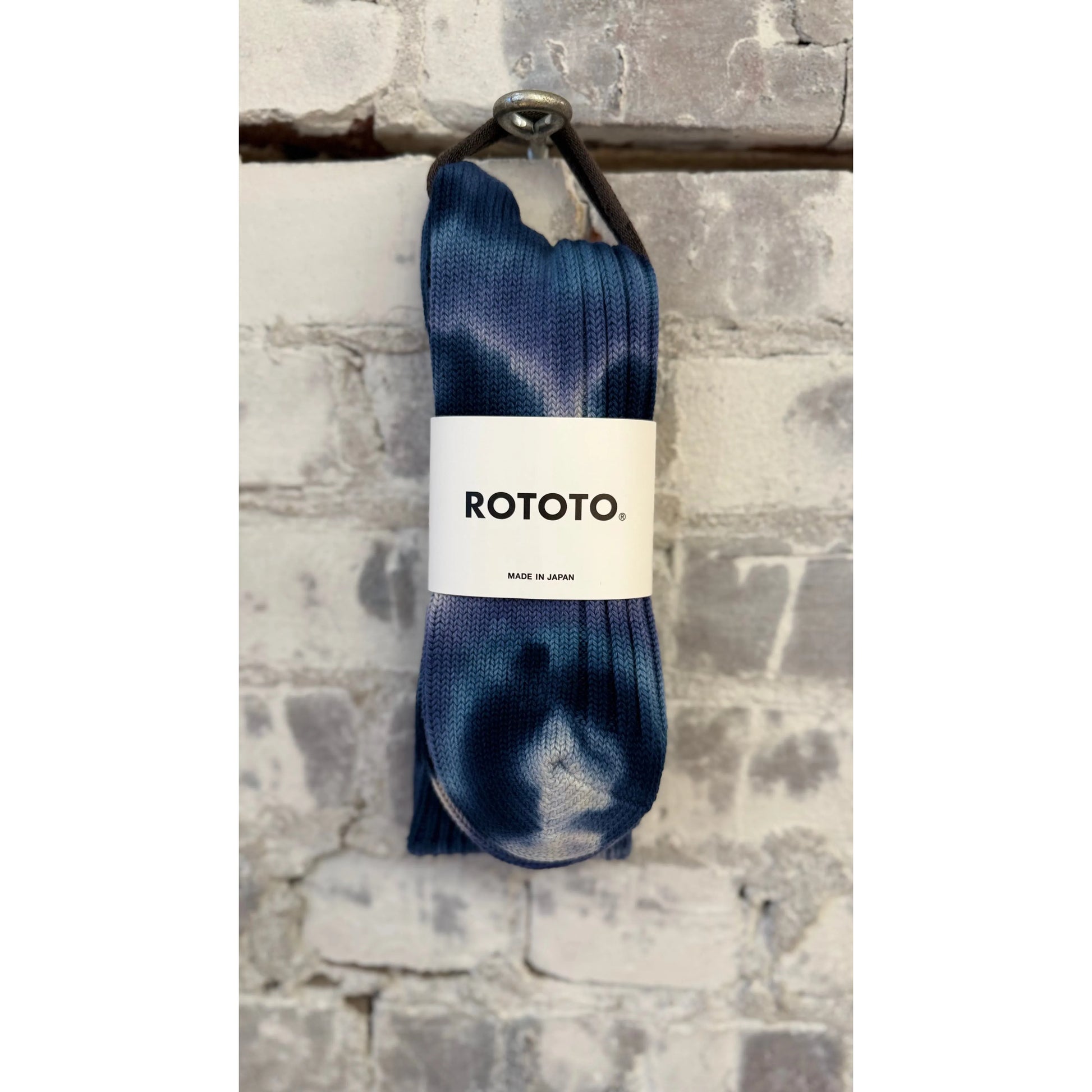 Men's chunky tie dye rib crew socks by Rototo in indigo and navy with bold, colorful tie dye pattern and ribbed texture.