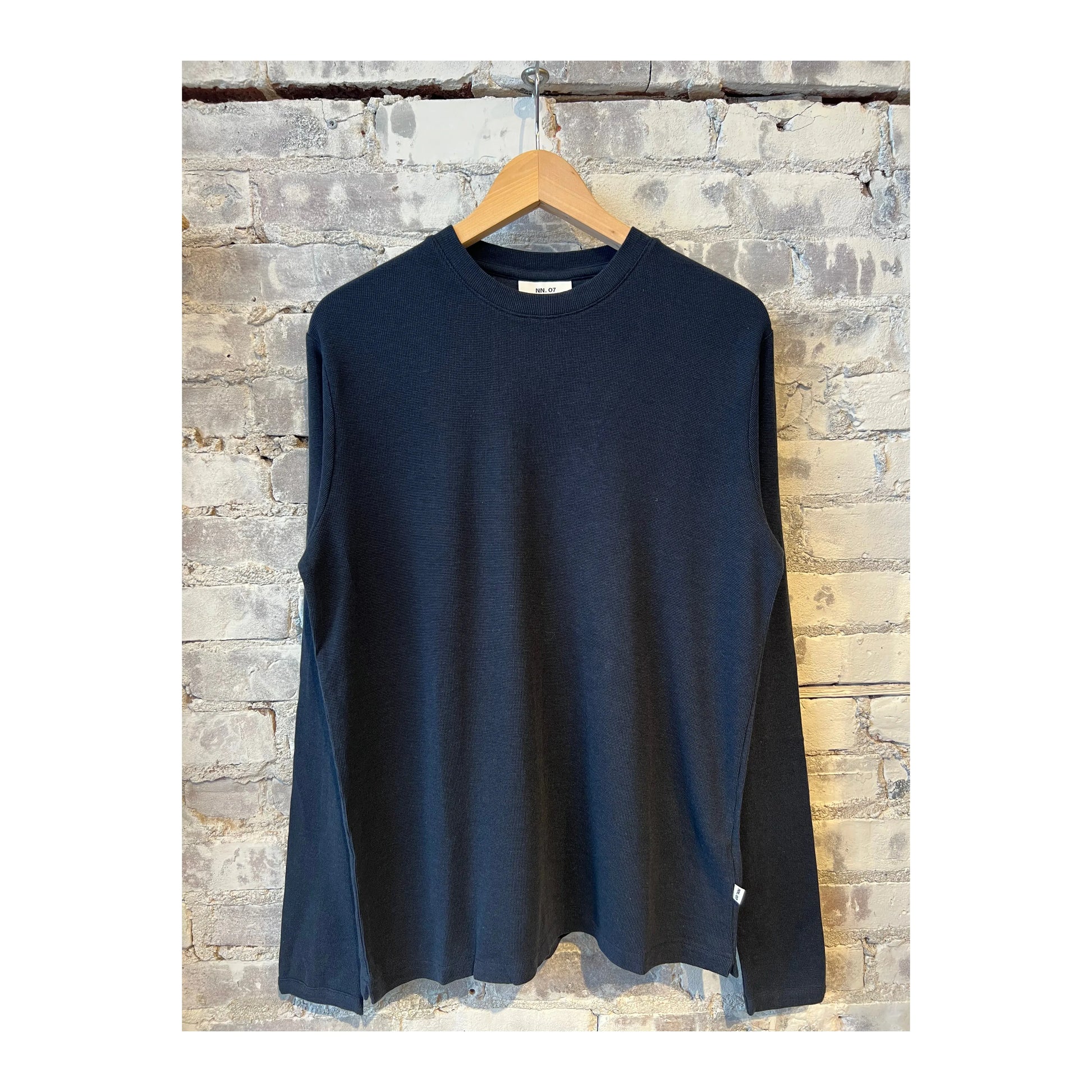 Navy blue men's Clive Waffle Knit Tee by NN07, shown flat with textured waffle knit fabric and round neckline.