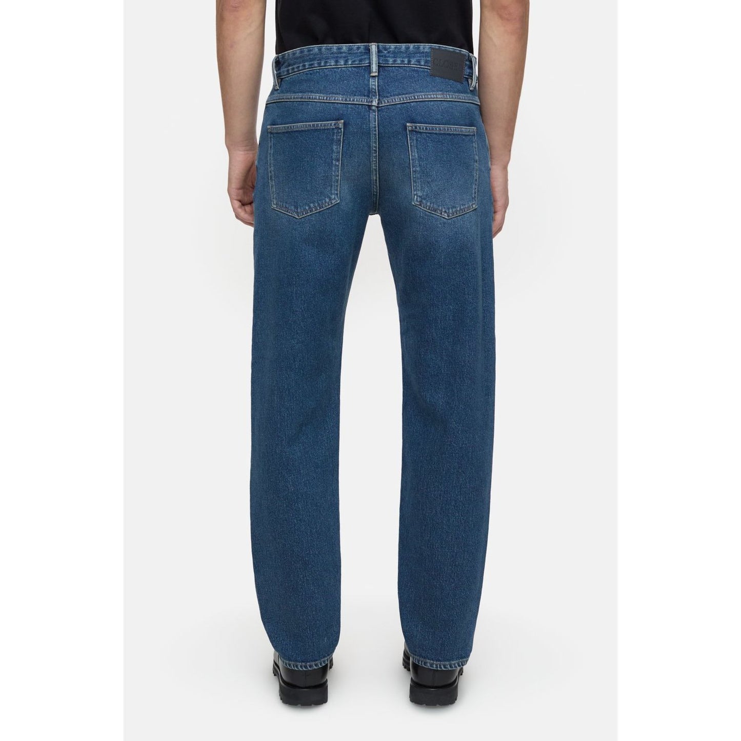 Men's mid blue Cooper True Comfort Stretch Jean by Closed Men's, showing a fitted mid-rise design and classic denim texture.