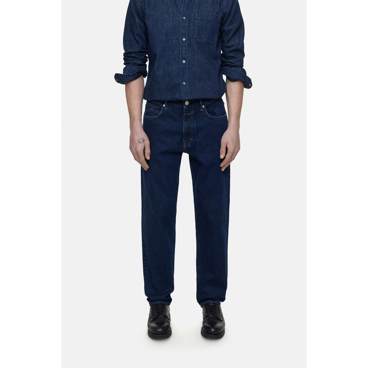 Men's dark blue Cooper True Comfort Stretch Jeans by Closed Men's, showing the fit and fabric texture.