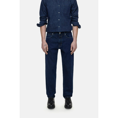 Men's dark blue Cooper True Comfort Stretch Jeans by Closed Men's, showing the fit and fabric texture.