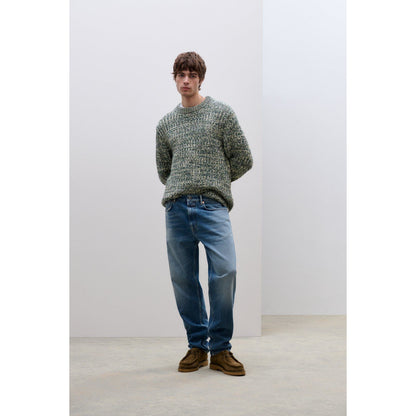 Men's Cooper True Comfort Stretch Regular Jeans in mid blue by Closed Men's, showing the relaxed fit and classic denim fabric.