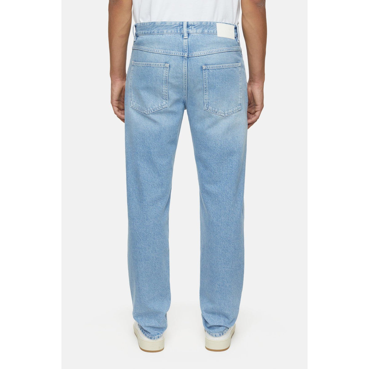 Men's light blue Cooper True Jeans by Closed Men's, showing classic denim fabric with a relaxed fit and traditional five-pocket design.