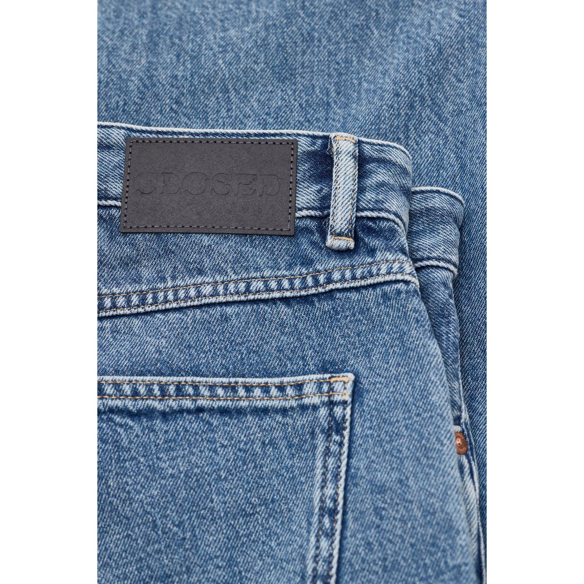Men's Cooper True Regular Jean in mid blue denim by Closed Men's, showing front view with classic fit and subtle stitching details.