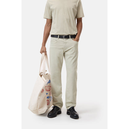 Men's Cooper True Stretch Jean in Cloud Grey by Closed Men's, showing fit and fabric texture on a model.