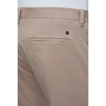 Men's Clifton True Slim Pant in Cashew Cream by Closed Men's, showing the slim fit design and premium fabric detail.
