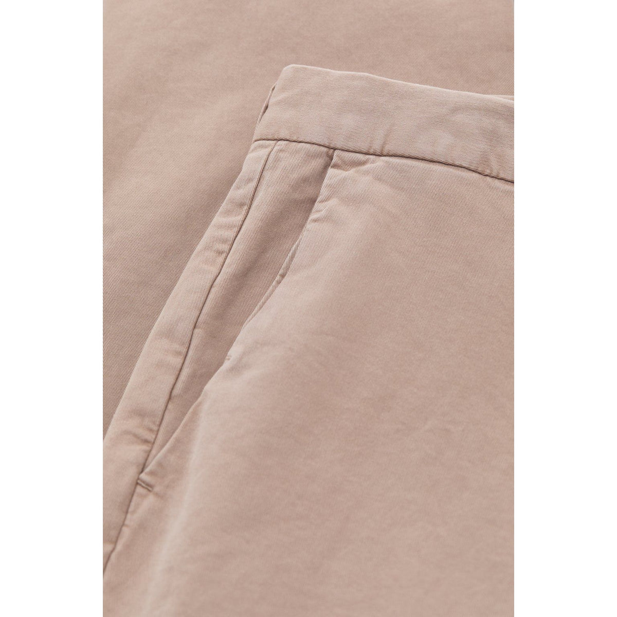 Men's Clifton True Slim Pant in Cashew Cream by Closed Men's, showing the tailored fit and fabric texture of the slim-fit trousers.