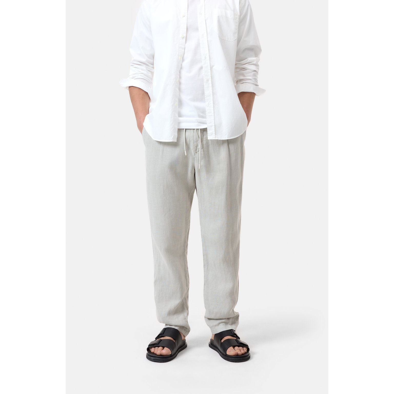 Men's Vigo Tapered Regular Pant in Cloud Grey by Closed Men's, showing the relaxed fit and soft fabric detail.