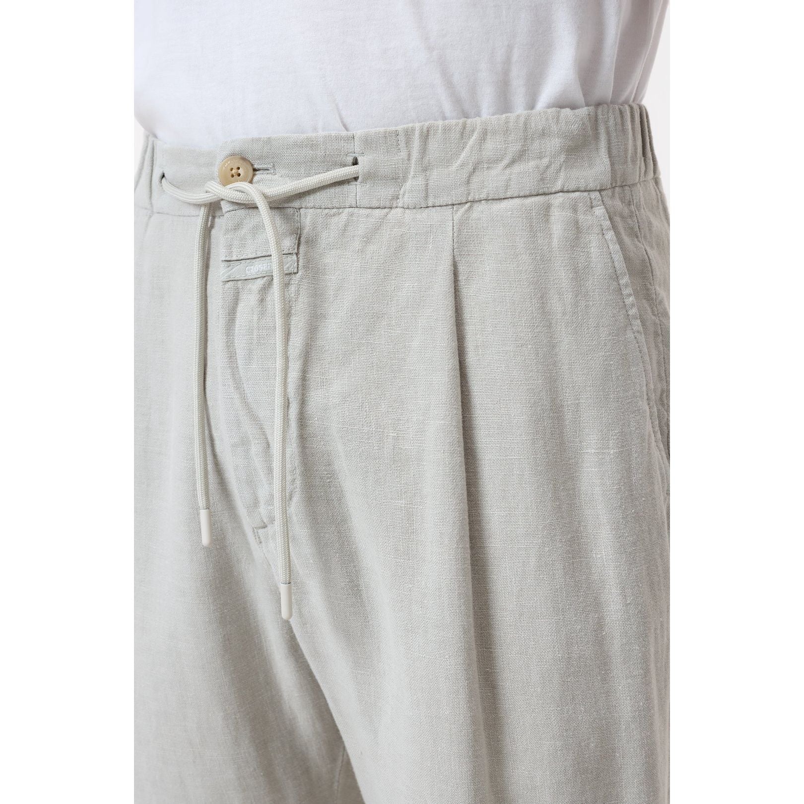Men's Vigo Tapered Regular Pant in Cloud Grey by Closed Men's showing a relaxed fit and tapered design in soft grey fabric.