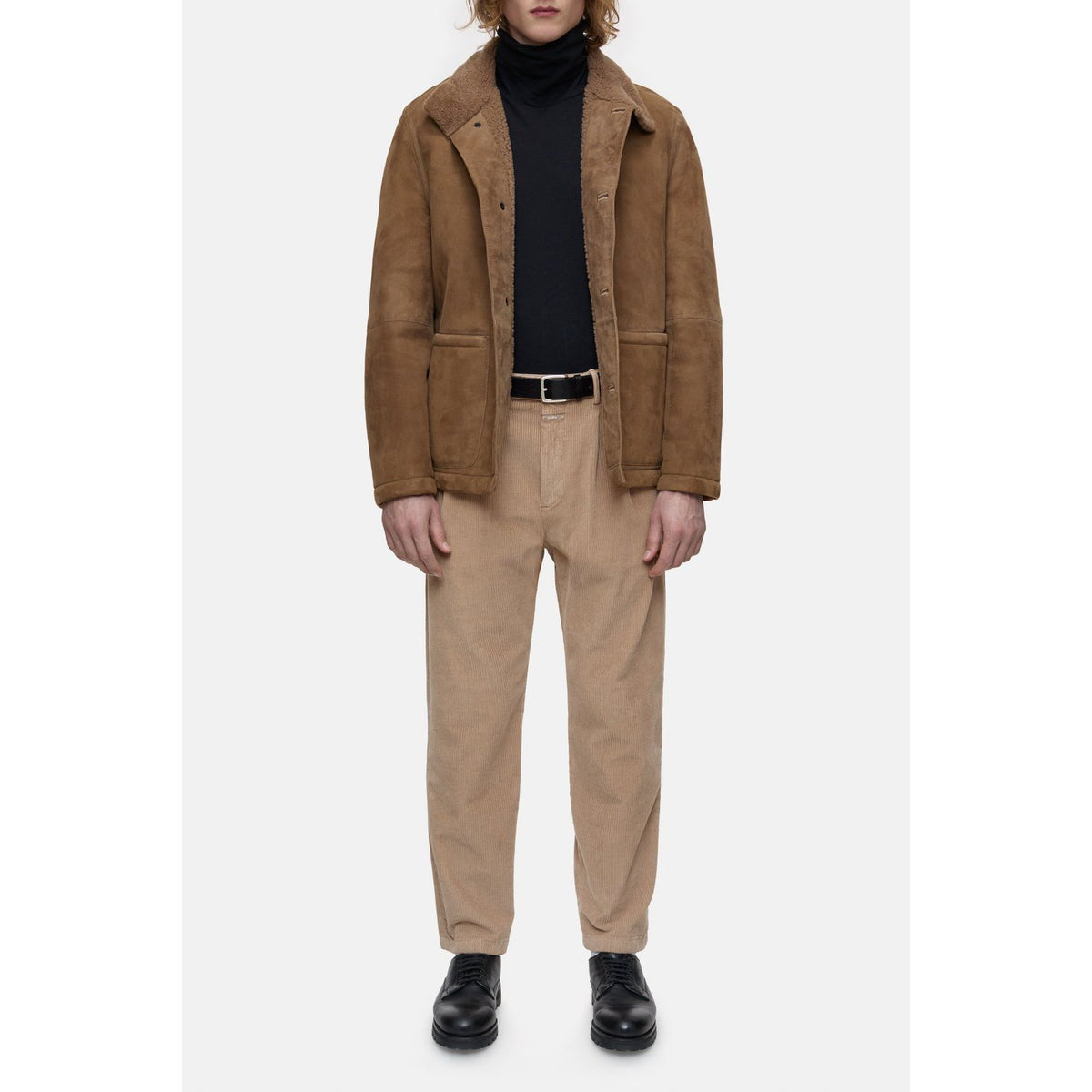 Men's chestnut lambskin jacket by Closed Men's, featuring a soft leather exterior and classic fit, shown on a model.