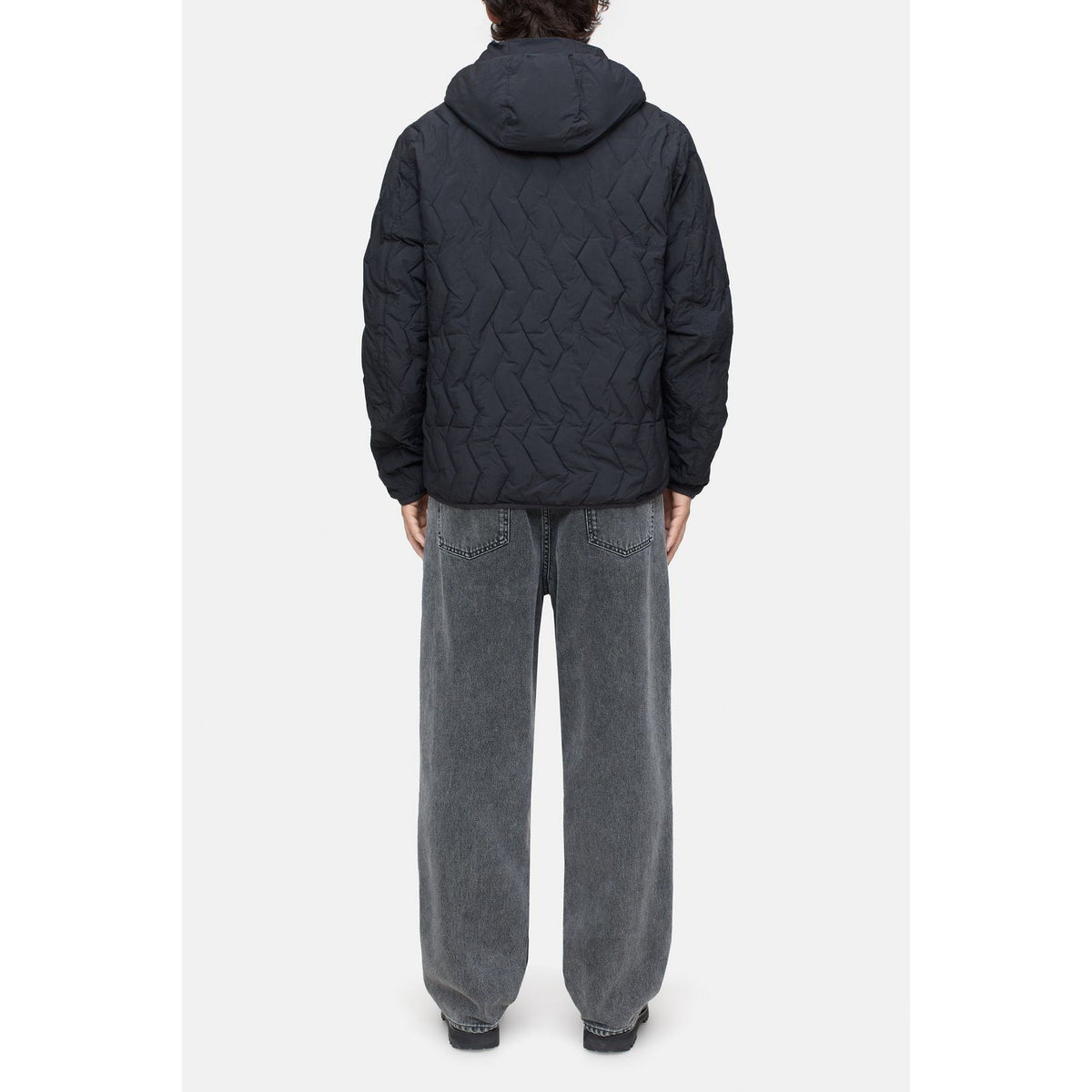 Men's black quilted jacket by Closed Men's, featuring a padded design and stylish fit, ideal for casual and outdoor wear.