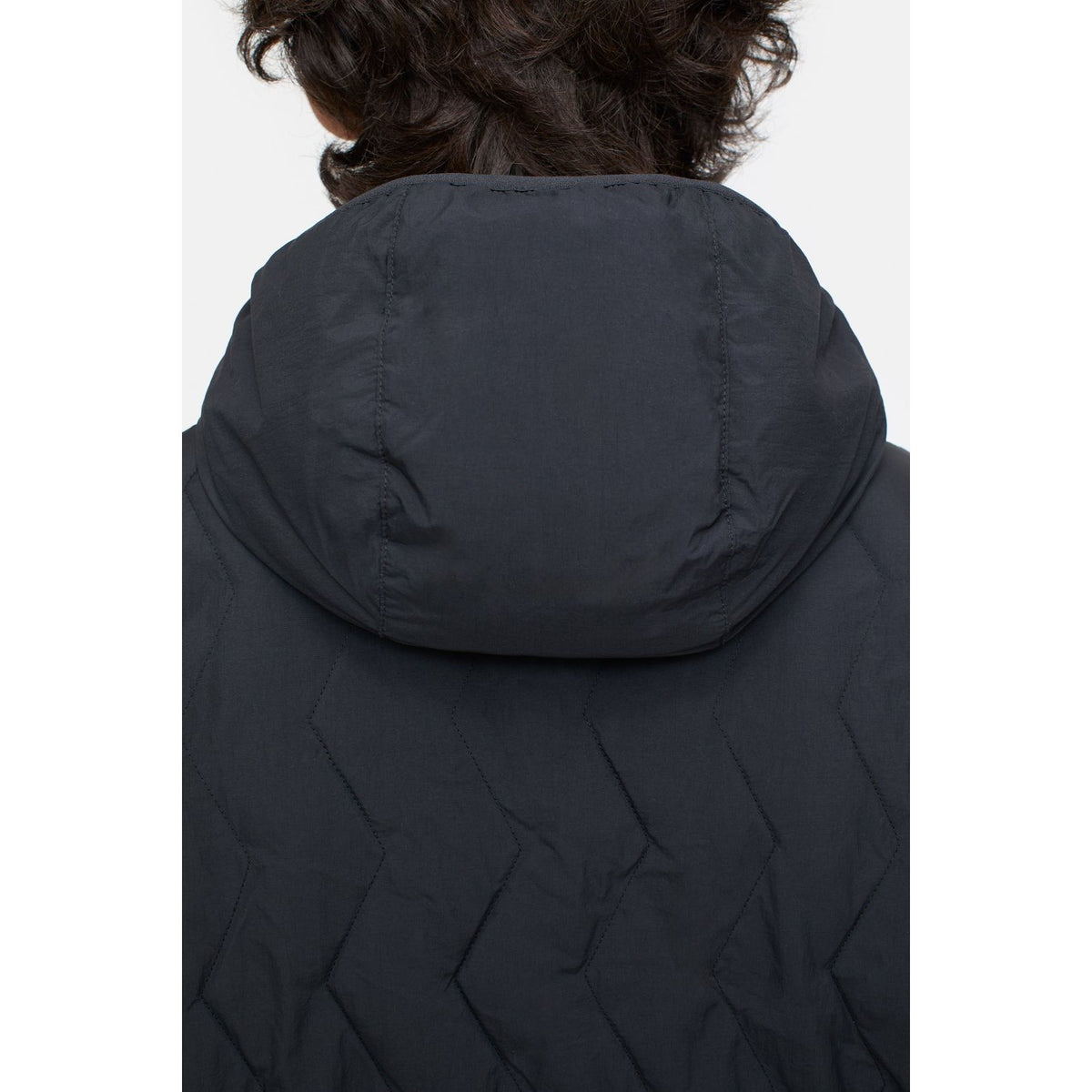 Men's black quilted jacket by Closed Men's, featuring a stylish insulated design and a comfortable fit.