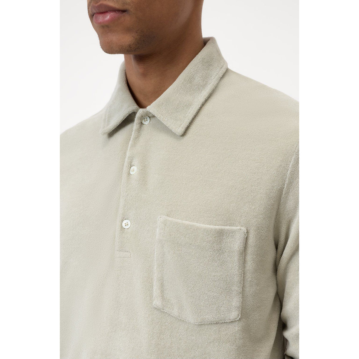 Men's Cloud Grey Terry Toweling Polo Shirt by Closed Men's, showing the soft textured fabric and classic fit.