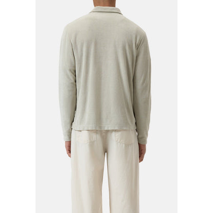 Men's Terry Toweling Polo Shirt in Cloud Grey by Closed Men's, showing the relaxed fit and soft terry fabric.