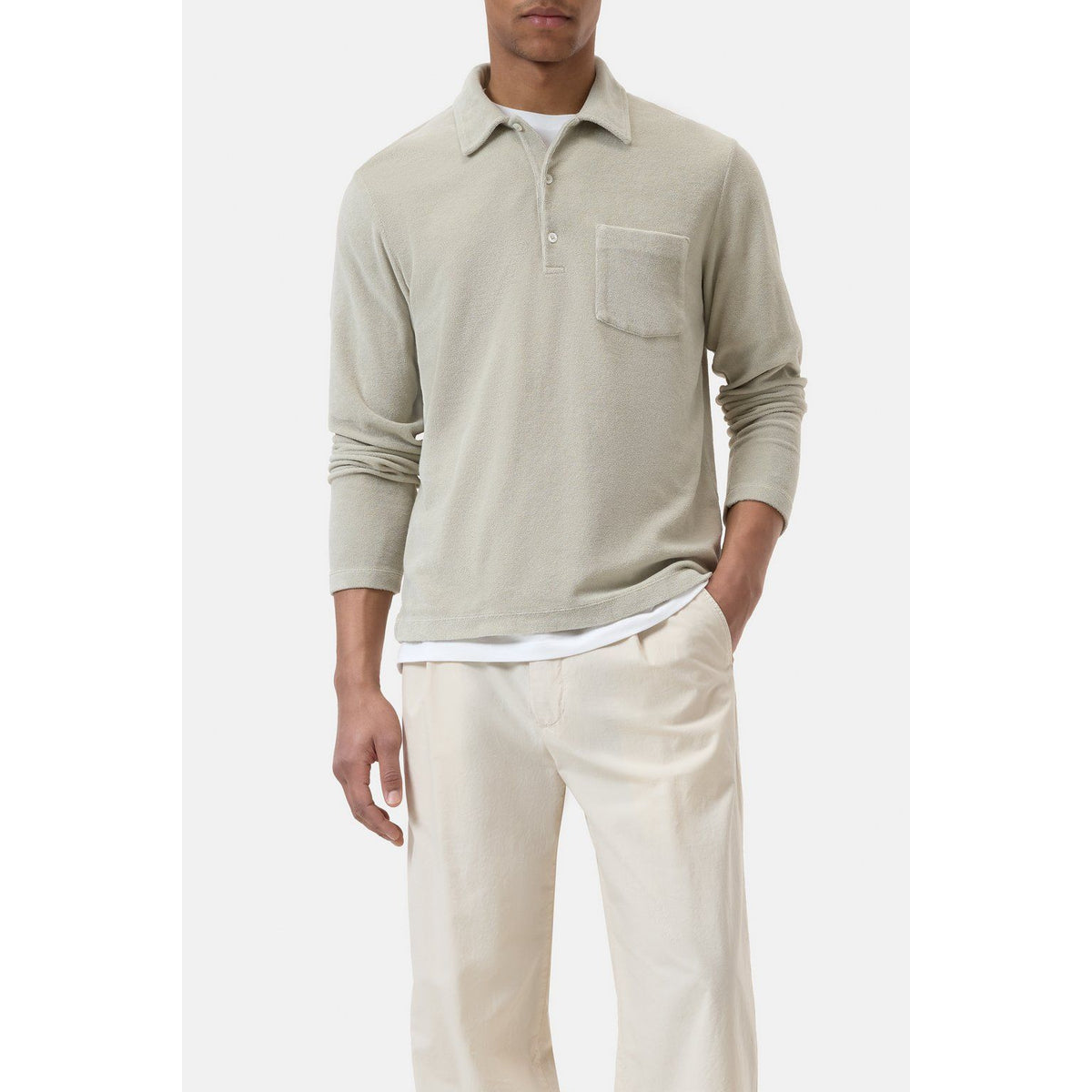 Men's Terry Toweling Polo Shirt in Cloud Grey by Closed Men's, showcasing the soft textured fabric and classic polo collar.