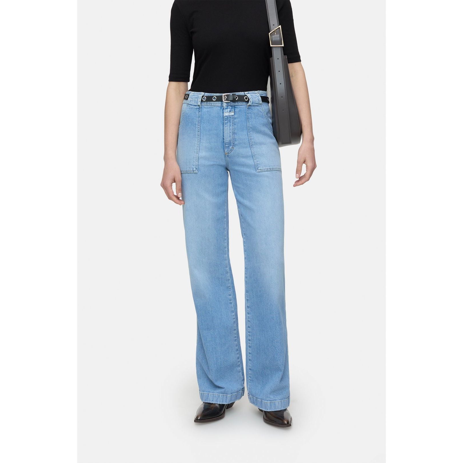 Light blue women's Aria Comfort Stretch Flared Jeans by Closed, showcasing the fitted waistband and flared leg silhouette.