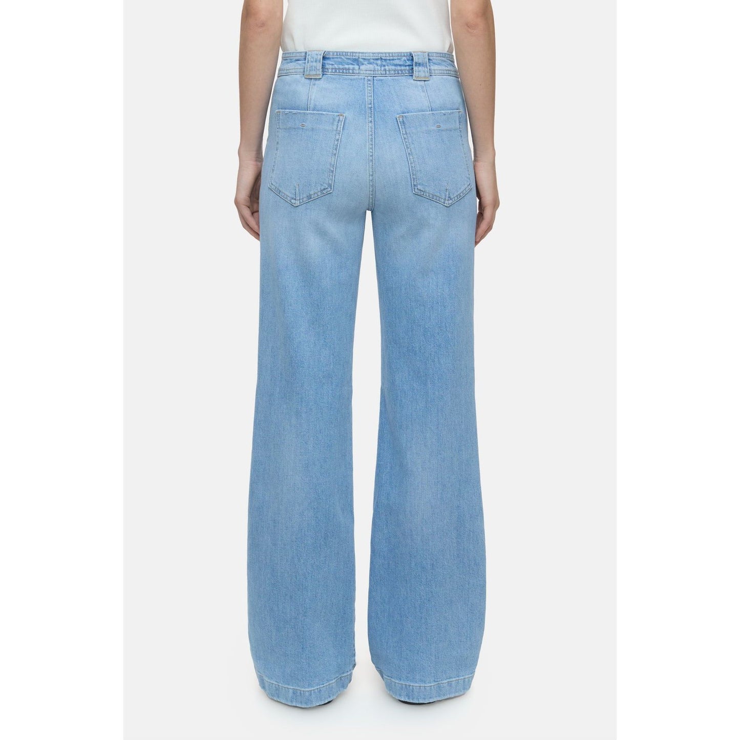 Light blue women's Aria Comfort Stretch Flared Jean by Closed Women's, showing the fitted waist and flared leg style.