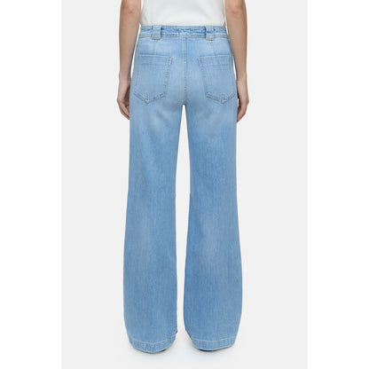 Light blue women's Aria Comfort Stretch Flared Jean by Closed Women's, showing the fitted waist and flared leg style.