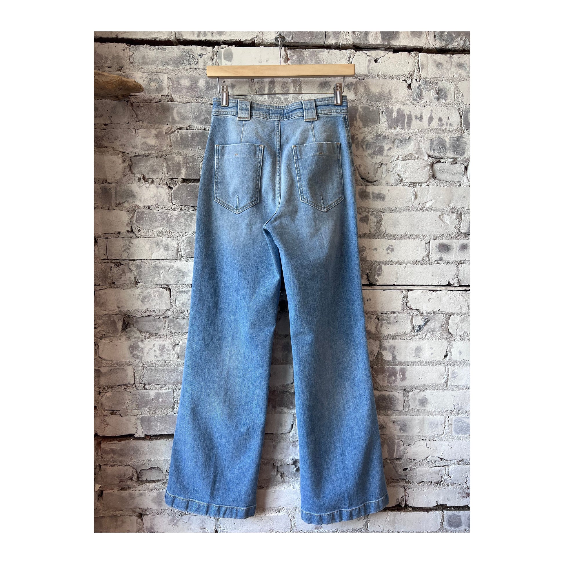 Light blue women's Aria Comfort Stretch Flared Jean by Closed, showing the fit and flared design on a model.