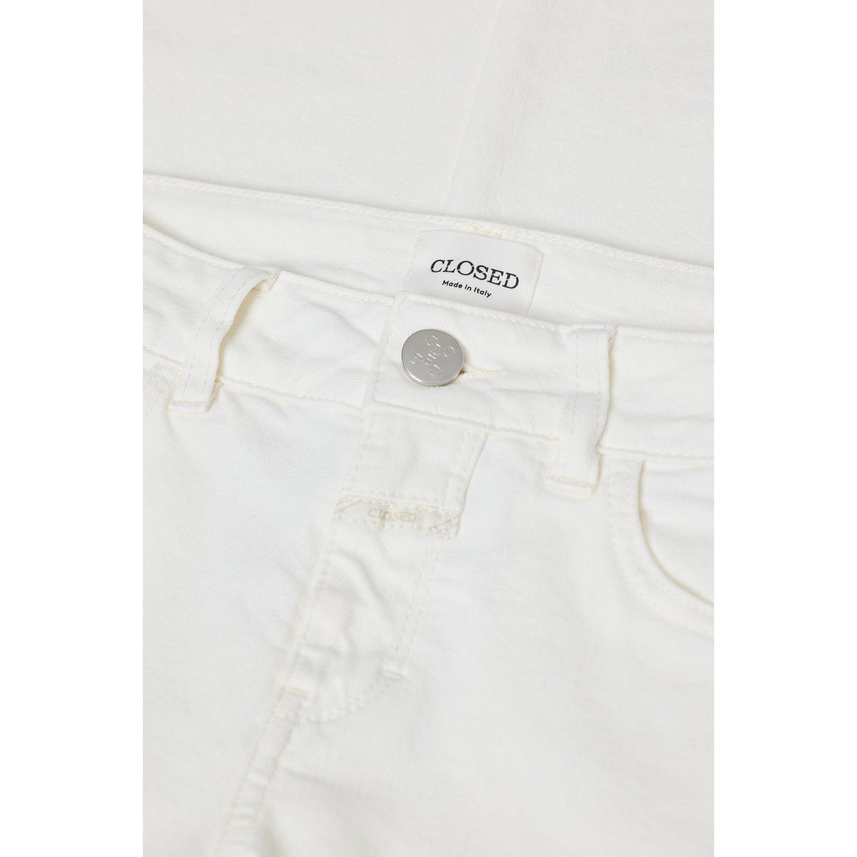 Women's Ivory Baker Power Stretch Skinny Jeans by Closed, showing close-up of fit and fabric texture.