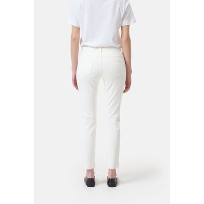 Closed Women's Baker Power Stretch Skinny Jeans in ivory, showcasing slim fit and stretch fabric for a comfortable, stylish look.