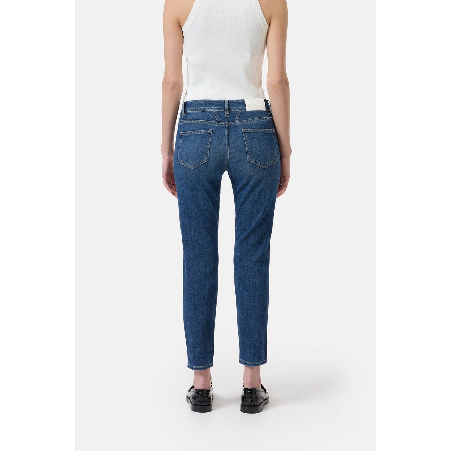 Women's Baker Skinny Jean by Closed in dark blue denim, close-up of fitted silhouette and classic stitching details.