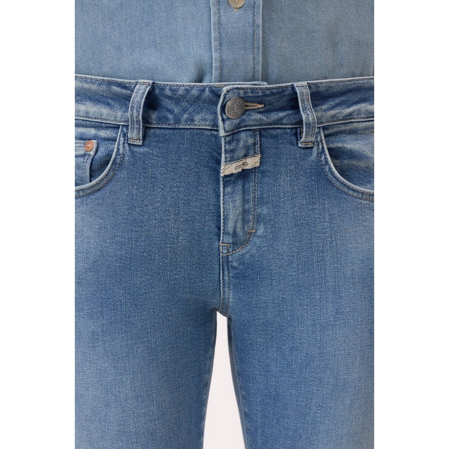 Women's Baker Stretch Skinny Jean in mid blue by Closed Women's, showcasing a fitted denim style with classic five-pocket design.