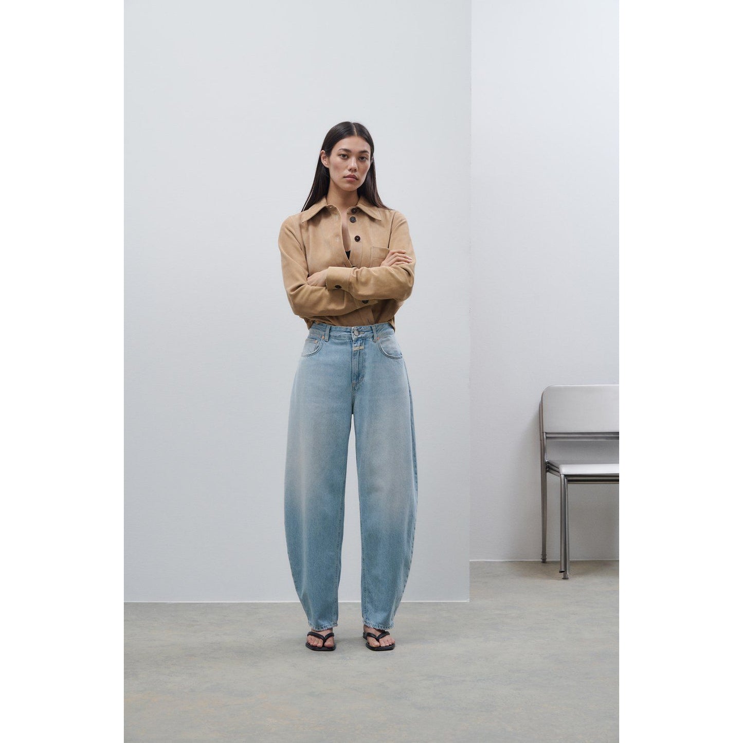 Light blue women's Jazzie Barrel Jeans by Closed Women's, showing relaxed fit and stylish denim design.