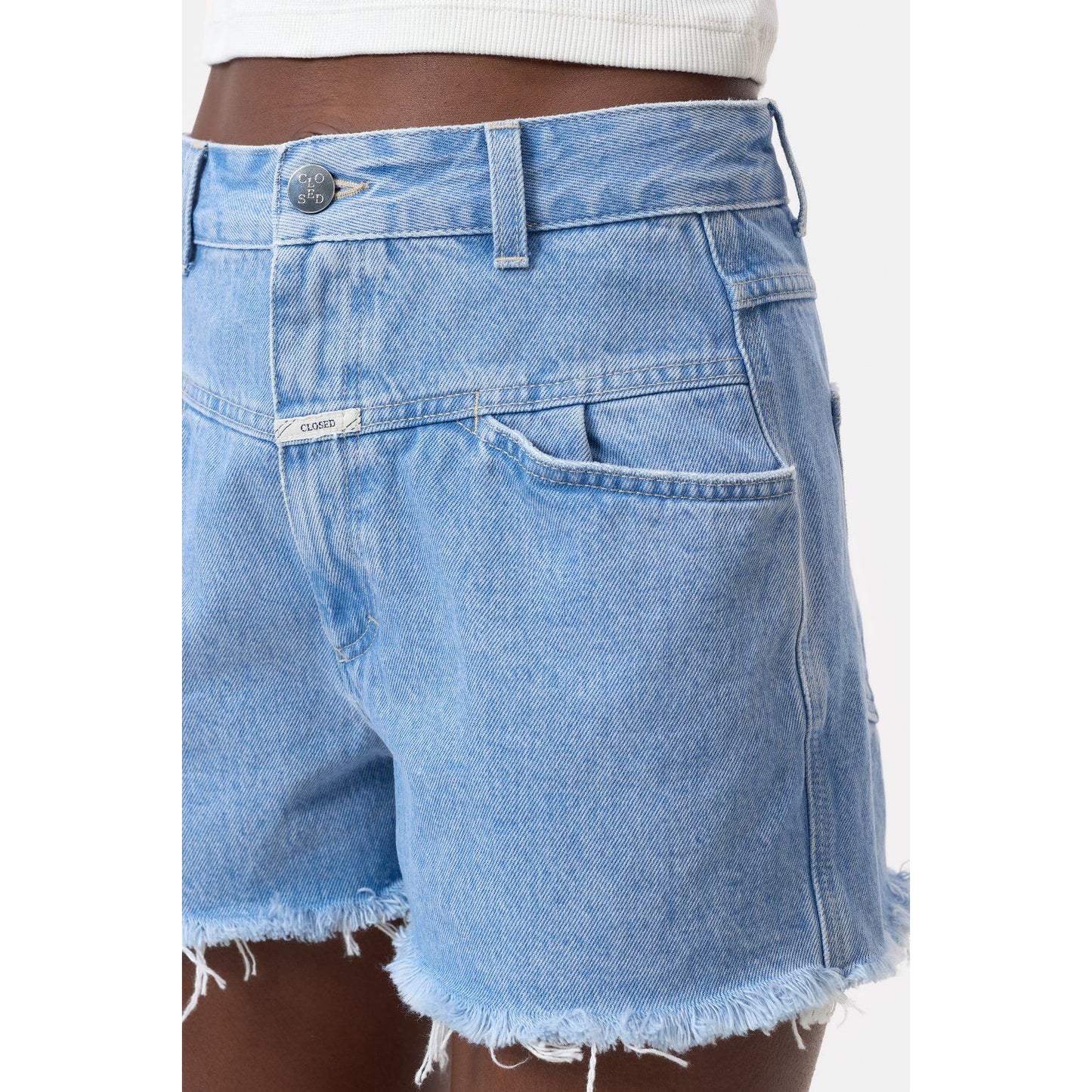Light blue women's Jocy-X denim shorts by Closed Women's, showing the front view with frayed hem and classic five-pocket design.