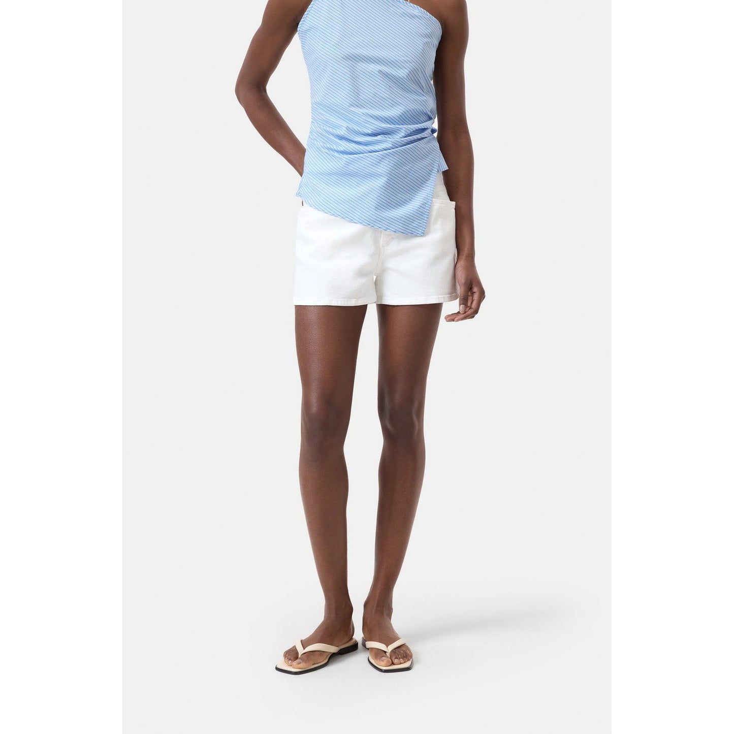 Women's white Jocy-X denim shorts by Closed Women's, showcasing the stylish cut and classic denim fabric.