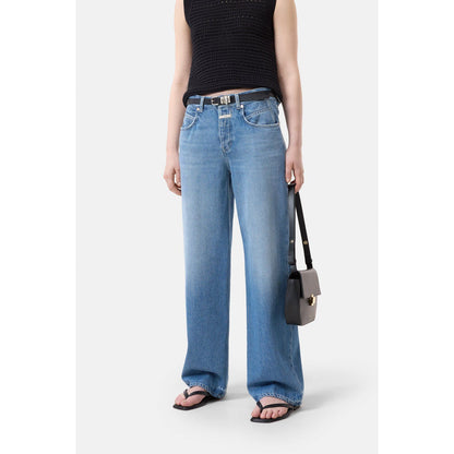 Mid blue women's Nikka Wide Jeans by Closed, showing the relaxed fit and denim texture with a focus on the waistband and pockets.