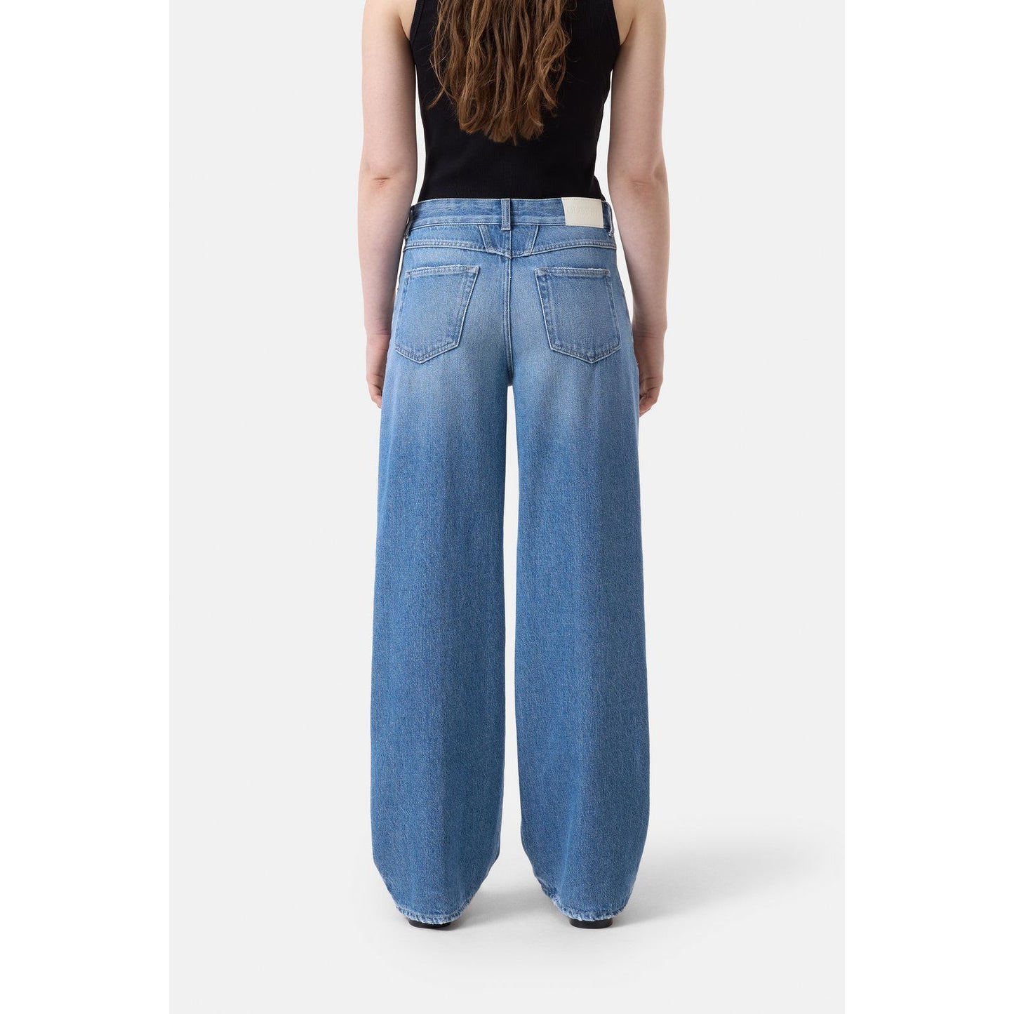 Mid blue women's Nikka Wide Jeans by Closed Women's, showing relaxed fit and classic denim texture.
