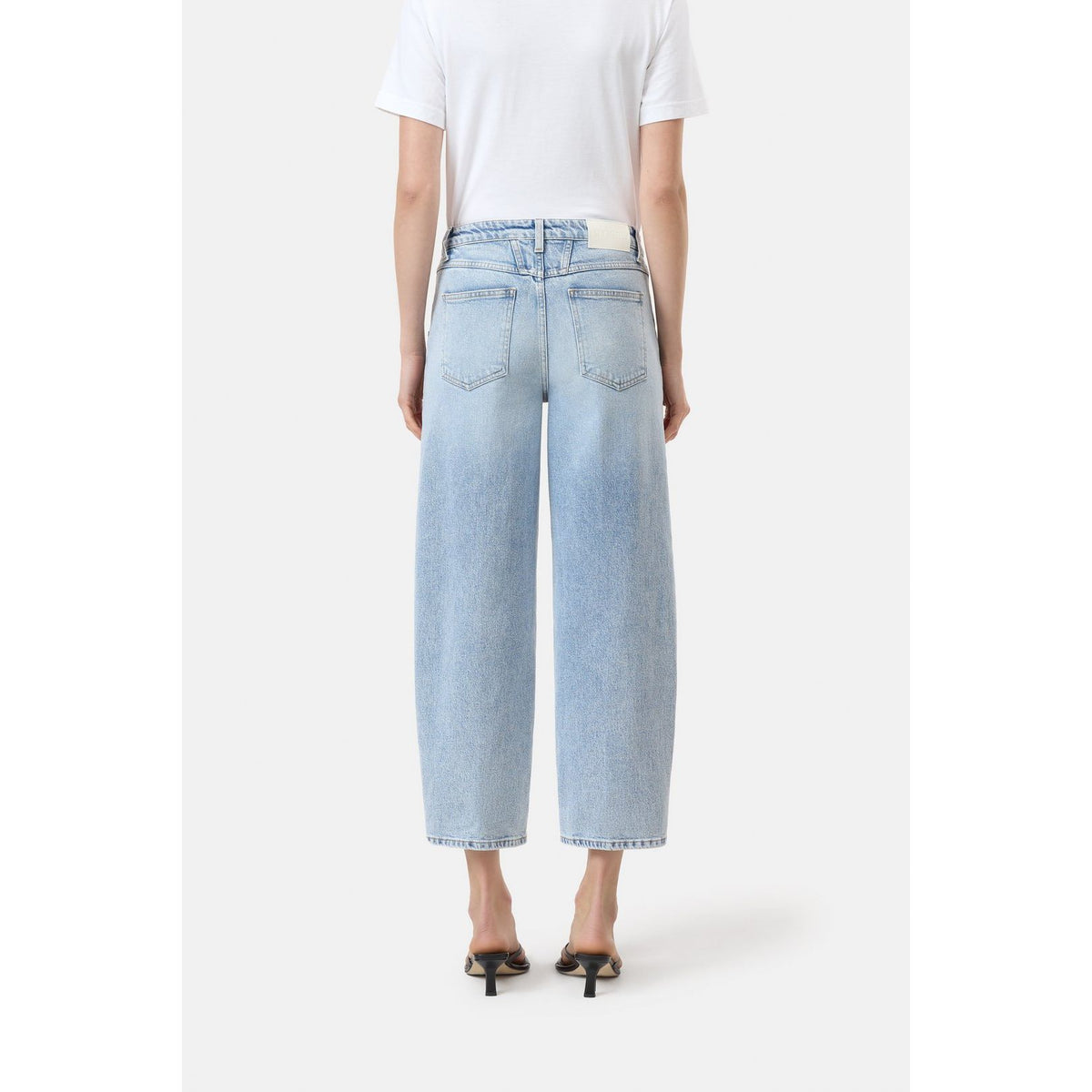 Light blue women's Stover-X Comfort Stretch Relaxed Jeans by Closed Women's, showing the relaxed fit and classic jean details.