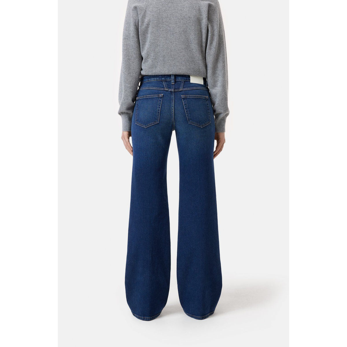 Close-up of Closed Women's Gillan Comfort Stretch Wide Jeans in dark blue denim, showcasing the fit and fabric texture.