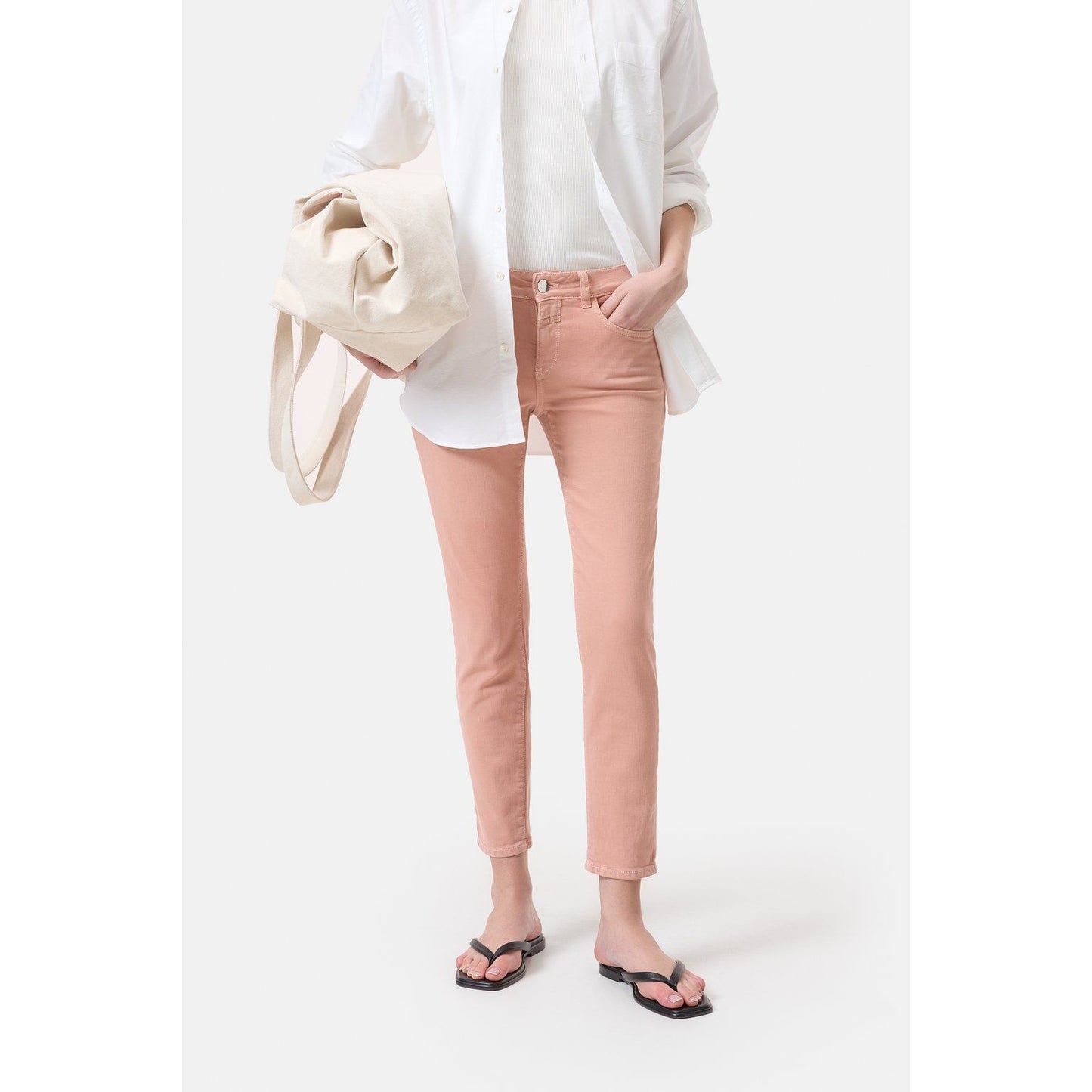 Closed Women's Baker Power Stretch Jeans in terracotta rose, showcasing the fitted, stretchy denim design and classic five-pocket style.