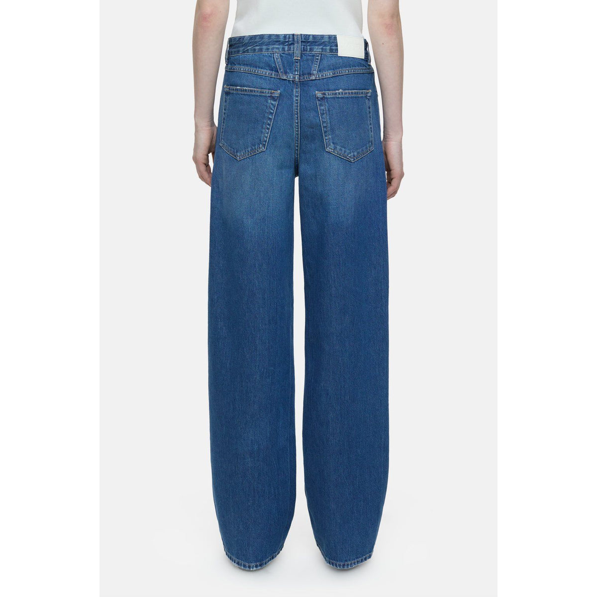 Closed Women's Nikka Wide Jean in mid blue denim, featuring a relaxed fit and classic five-pocket design.