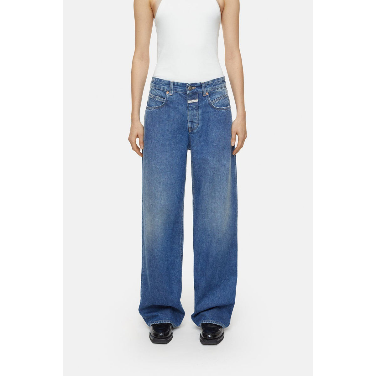 Women's Nikka Wide Jean in mid blue denim, featuring a relaxed fit and classic five-pocket design, by Closed Women's.