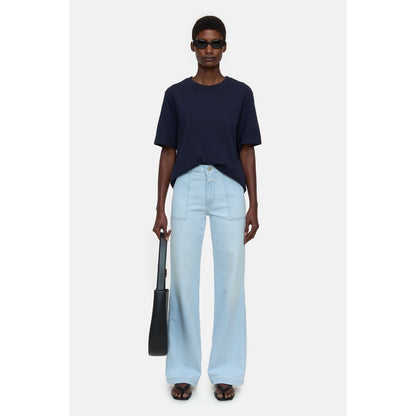 Light blue women's Aria Slim Jeans by Closed Women's, showing fit and denim fabric detail.