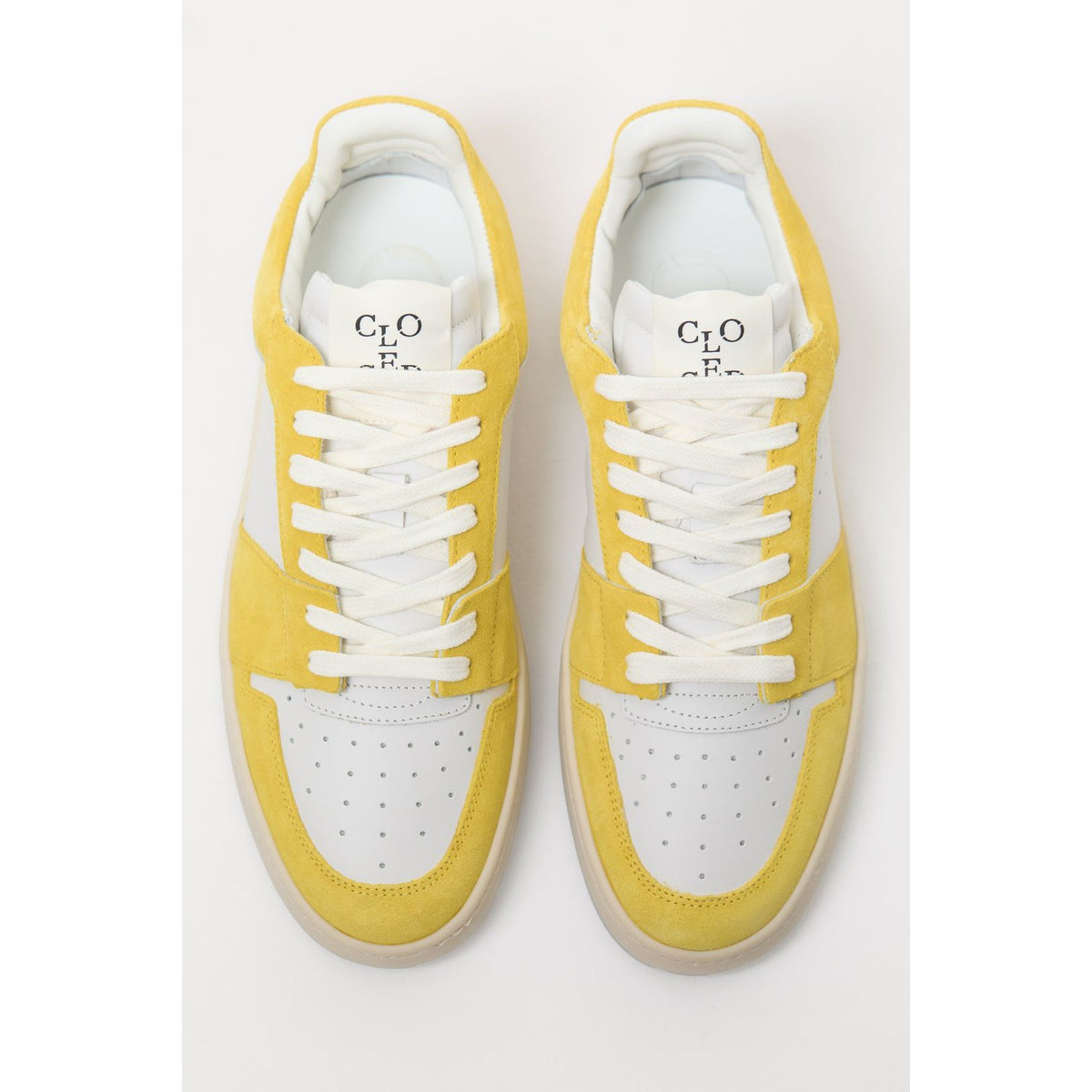 Women's primary yellow low-top sneaker by Closed Women's, featuring a sleek design and comfortable fit.