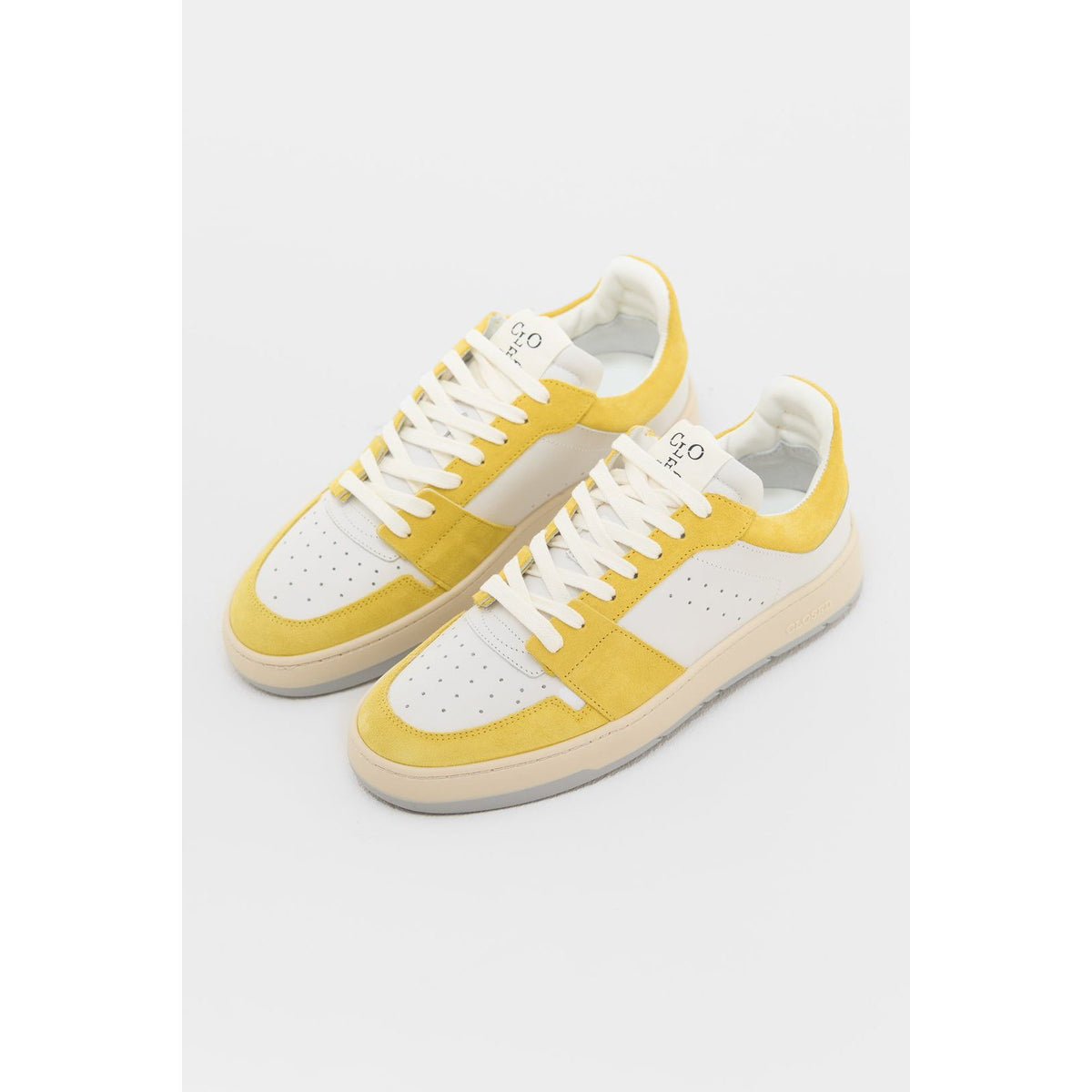 Women's primary yellow low-top sneaker by Closed Women's, featuring a sleek design and comfortable fit.