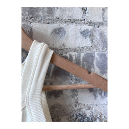 Women's ivory cropped racer top by Closed Women's, with a fitted sleeveless design and rounded neckline.